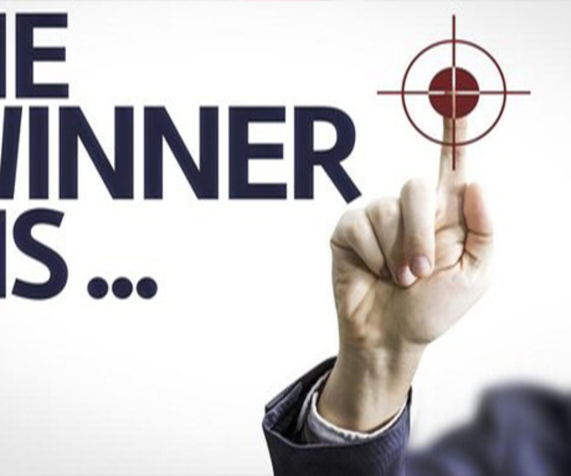 pointing at the winner
