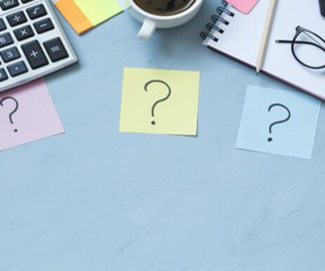 three question marks written on post-it notes